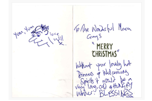 A handwritten Christmas card that says, "To the Wonderful Marah Guys, MERRY CHRISTMAS. Without your lovely hot dinners & welcoming spirits it would be a very long, cold & HUNGRY winter! BLESSINGS." It includes a small cartoon drawing of a face saying "Yum, Yum."